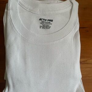 New Activ Pro men's white thermal underwear set in size medium (38-40).